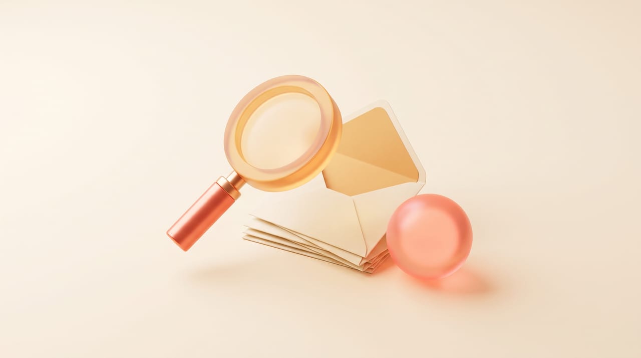 A magnifying glass over envelopes beside a glowing assistant orb, representing Claude reading emails in a chat